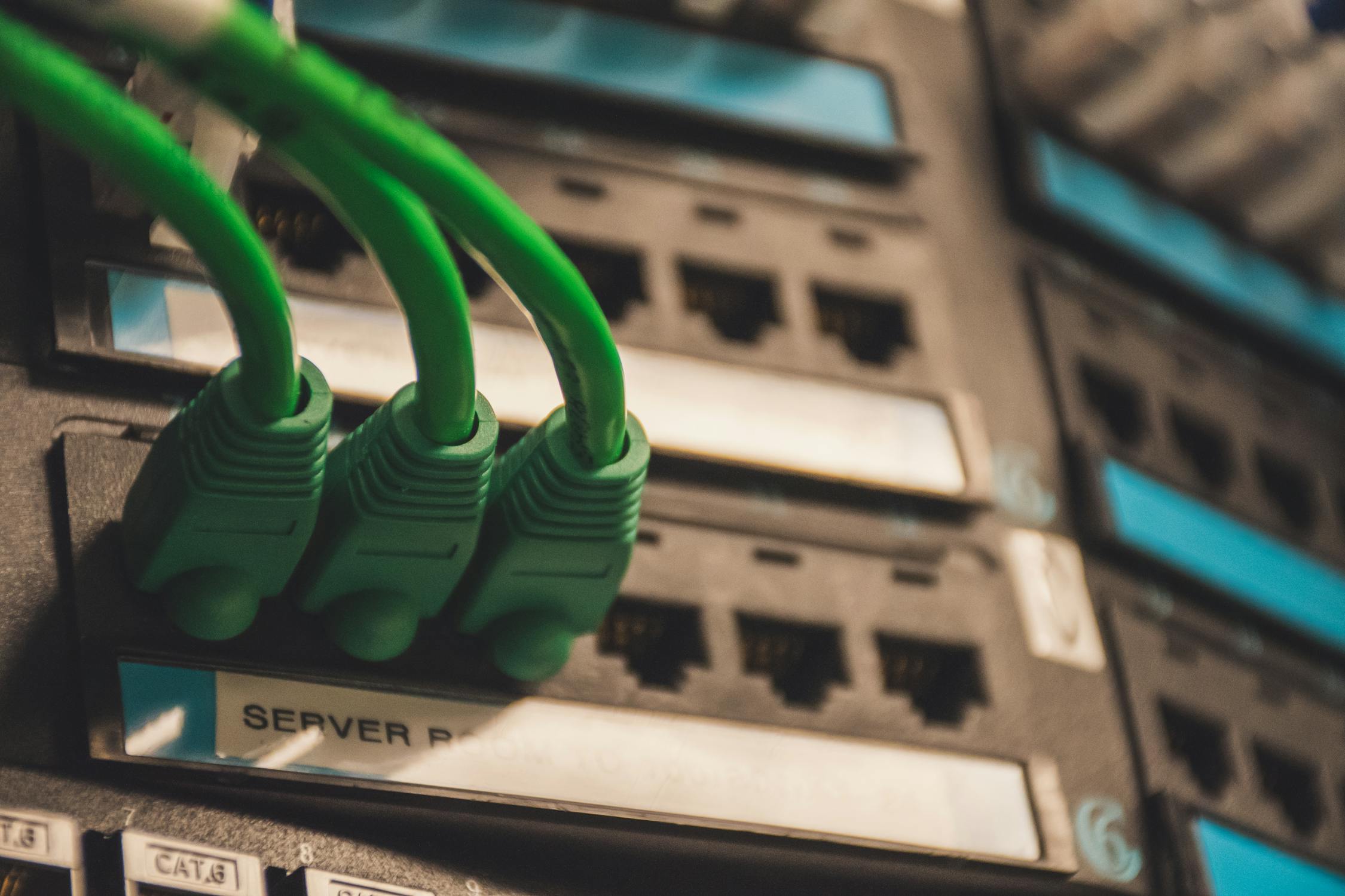 Network cables plugged into server ports